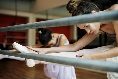 Young dancers, getting ready for ballet class.
